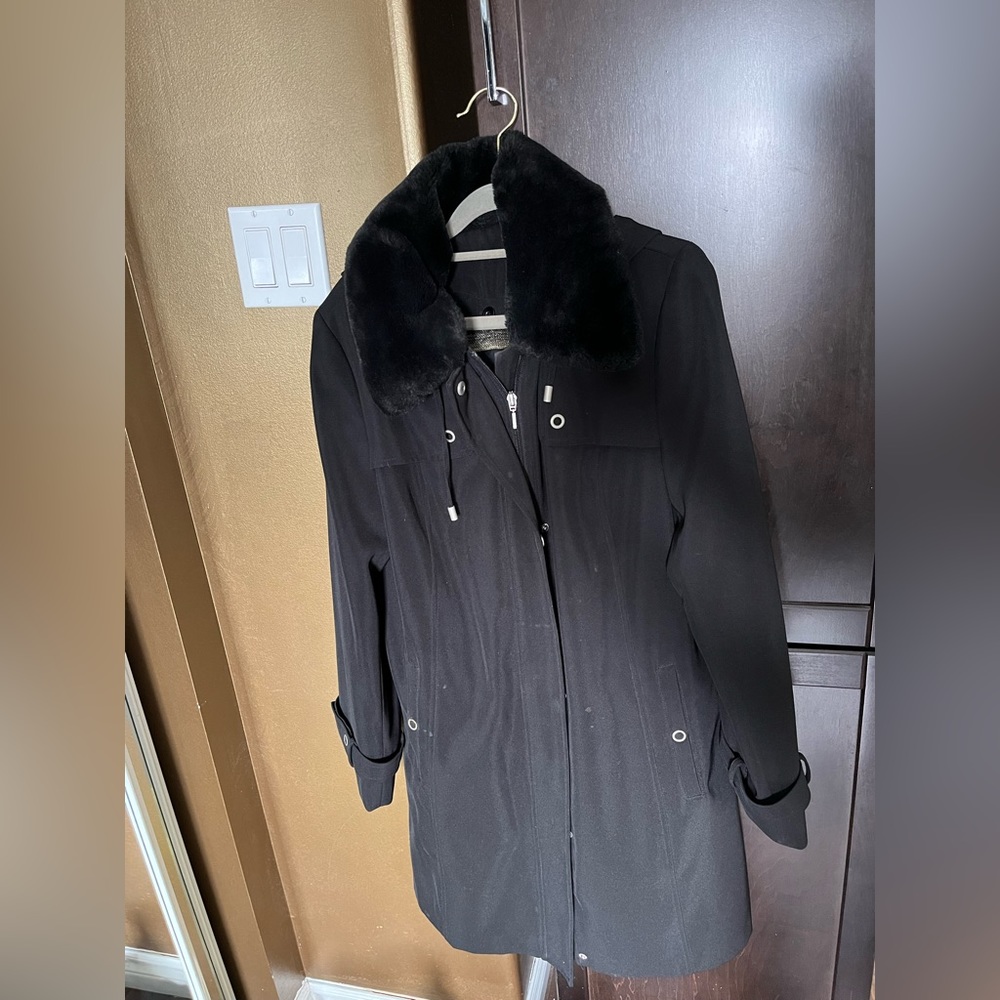 Ladies jacket size 8, black fur on hood